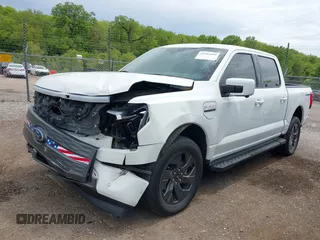 2022 Ford F-150 Lightning Pro with VIN 1FTVW1EL3NWG16132, listed as a IAAI auction lot 42362459 with 16,509 mi miles and . Bid and sale history available at DreamBid. Image 18.