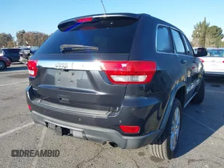 2013 Jeep Grand Cherokee Laredo with VIN 1C4RJEAG2DC643290, listed as a IAAI auction lot 41751696 with 125,258 mi miles. Bid and sale history available at carsss.com. Image 4.