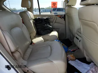 2012 Infiniti QX56 7-passenger with VIN JN8AZ2NE1C9017744, listed as a Copart auction lot 52988725 with 142,820 mi miles and Salvage title. Bid and sale history available at DreamBid. Image 11.