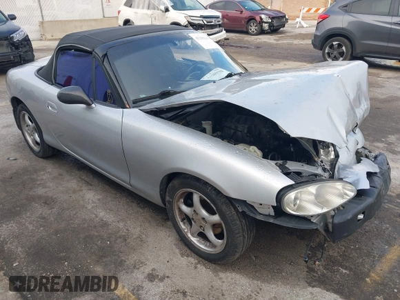 2002 Mazda MX-5 Miata Cloth z VIN JM1NB353320230803, wystawiony jako IAAI lot #41209388 z przebiegiem 84 815 mil mil oraz . Historia ofert i sprzedaży dostępna na DreamBid. Obrazek 1.