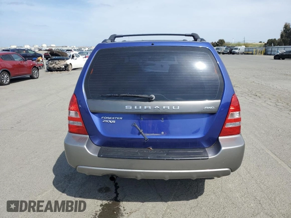 2003 Subaru Forester XS z VIN JF1SG65633H749522, wystawiony jako Copart lot #53393445 z przebiegiem 138 592 mil mil oraz Szkoda całkowita • Salvage title. Historia ofert i sprzedaży dostępna na DreamBid. Obrazek 6.