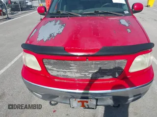 2003 Ford F-150 XLT with VIN 1FTRW08L43KD14456, listed as a IAAI auction lot 42098830 with 234,908 mi miles. Bid and sale history available at carsss.com. Image 6.