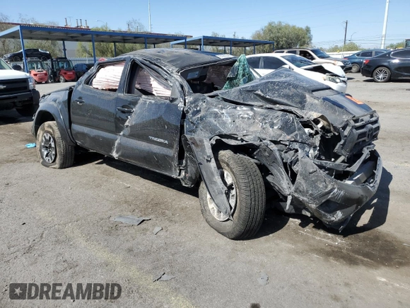 2014 Toyota Tacoma PreRunner with VIN 3TMJU4GN0EM170736, listed as a Copart auction lot 61993545 with 194,801 mi miles and Salvage title. Bid and sale history available at DreamBid. Image 4.