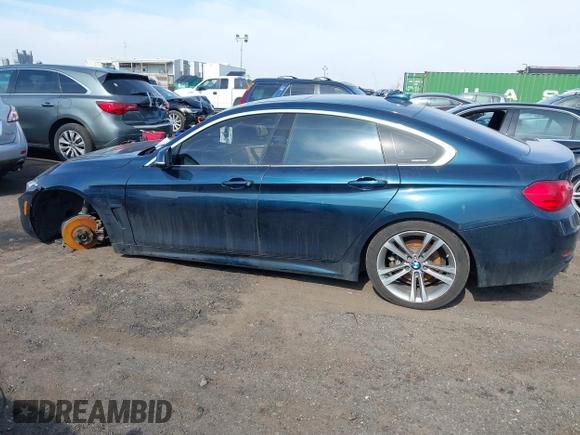 2016 BMW 4 Series 428i xDrive with VIN WBA4C9C56GG141089, listed as a IAAI auction lot 41587479 with 85,462 mi miles and . Bid and sale history available at DreamBid. Image 14.