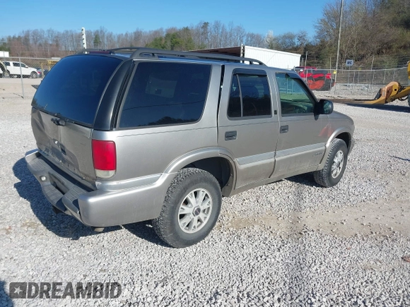 2001 GMC Jimmy SLE z VIN 1GKDT13W812117348, wystawiony jako IAAI lot #41846712 z przebiegiem 180 977 mil mil oraz . Historia ofert i sprzedaży dostępna na DreamBid. Obrazek 4.
