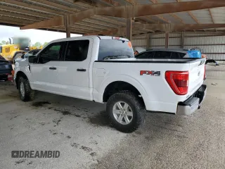 2023 Ford F-150 XL with VIN 1FTFW1E59PKE35312, listed as a Copart auction lot 50796195 with 19,849 mi miles and Salvage Title. Bid and sale history available at carsss.com. Image 2.