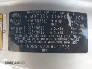 2012 Kia Sedona LX with VIN KNDMG4C70C6491703, listed as a IAAI auction lot 42128411 with 246,586 mi miles. Bid and sale history available at carsss.com. Image 9.