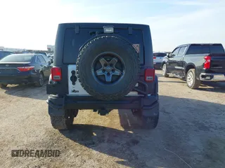 2013 Jeep Wrangler Unlimited Rubicon with VIN 1C4BJWFG0DL529739, listed as a IAAI auction lot 41587047 with 93,116 mi miles. Bid and sale history available at carsss.com. Image 16.