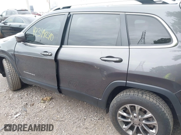 2020 Jeep Cherokee Latitude Plus with VIN 1C4PJMLBXLD580130, listed as a IAAI auction lot 42344240 with 82,814 mi miles and . Bid and sale history available at DreamBid. Image 14.