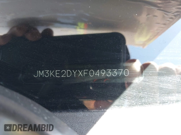 2015 Mazda CX-5 Grand Touring with VIN JM3KE2DYXF0493370, listed as a IAAI auction lot 42087156 with 161,464 mi miles. Bid and sale history available at carsss.com. Image 9.