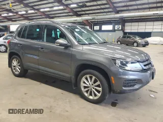 2015 Volkswagen Tiguan SE z VIN WVGBV7AX8FW574023, wystawiony jako Copart lot #50027465 z przebiegiem 101 145 mil mil oraz Czysty tytuł • Clean title. Historia ofert i sprzedaży dostępna na DreamBid. Obrazek 4.