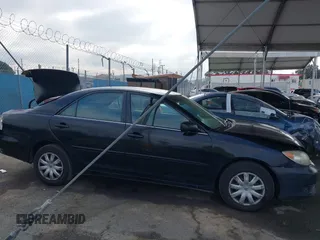 2006 Toyota Camry STD with VIN 4T1BE32K16U165708, listed as a IAAI auction lot 42138137 with 156,438 mi miles and . Bid and sale history available at DreamBid. Image 13.