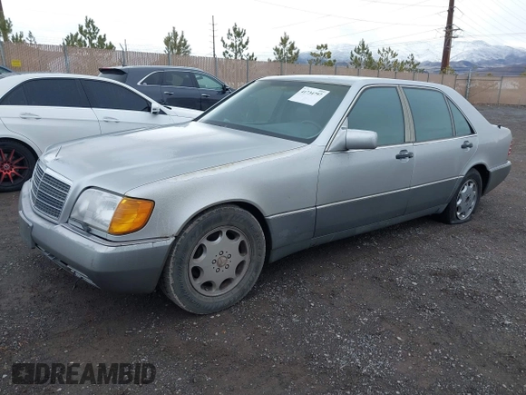 1994 Mercedes-Benz S with VIN WDBGA43E0RA162923, listed as a IAAI auction lot 42012249 with 107,498 mi miles and . Bid and sale history available at DreamBid. Image 2.