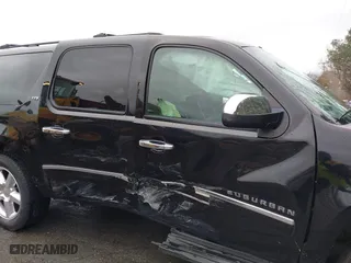2011 Chevrolet Suburban LTZ with VIN 1GNSCKE02BR206544, listed as a IAAI auction lot 41159341 with 218,202 mi miles. Bid and sale history available at carsss.com. Image 6.