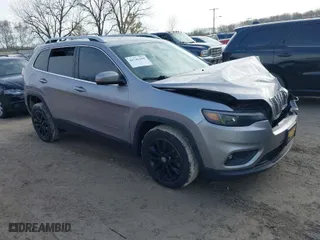2019 Jeep Cherokee Latitude Plus with VIN 1C4PJLLBXKD123309, listed as a IAAI auction lot 41746458 with 96,353 mi miles. Bid and sale history available at carsss.com. Image 1.