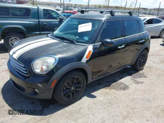 2012 MINI Countryman with VIN WMWZB3C51CWM05034, listed as a IAAI auction lot 42235437 with 131,280 mi miles and . Bid and sale history available at DreamBid. Image 2.
