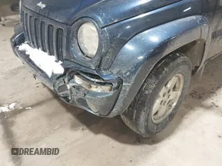 2004 Jeep Liberty Limited with VIN 1J4GL58K44W161408, listed as a IAAI auction lot 41585222 with 208,194 mi miles. Bid and sale history available at carsss.com. Image 12.