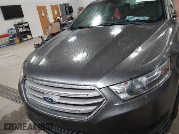 2015 Ford Taurus SEL with VIN 1FAHP2E87FG207029, listed as a IAAI auction lot 41752890 with 119,858 mi miles and . Bid and sale history available at carsss.com. Image 12.