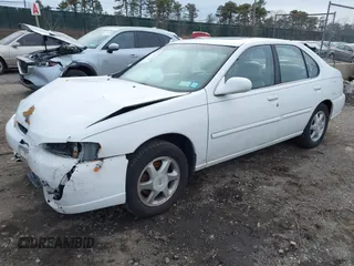 1999 Nissan Altima XE with VIN 1N4DL01D2XC184334, listed as a IAAI auction lot 41617706 with 91,348 mi miles. Bid and sale history available at carsss.com. Image 2.