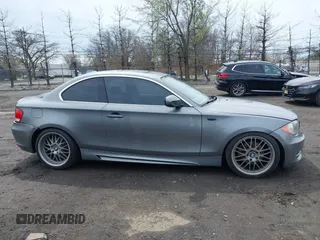 2011 BMW 1 Series 128i z VIN WBAUP9C52BVL89591, wystawiony jako IAAI lot #41951870 z przebiegiem 131 377 mil mil oraz . Historia ofert i sprzedaży dostępna na DreamBid. Obrazek 13.