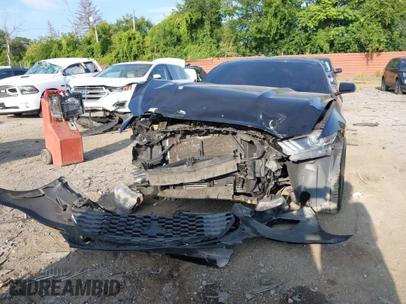 2015 Ford Mustang EcoBoost z VIN 1FA6P8TH1F5303375, wystawiony jako IAAI lot #40158795 z przebiegiem 134 668 mil mil oraz . Historia ofert i sprzedaży dostępna na DreamBid. Obrazek 6.