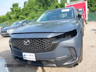 2024 Mazda CX-50 S Premium z VIN 7MMVABDM7RN231991, wystawiony jako IAAI lot #42481427 z przebiegiem 7 843 mil mil oraz . Historia ofert i sprzedaży dostępna na DreamBid. Obrazek 19.