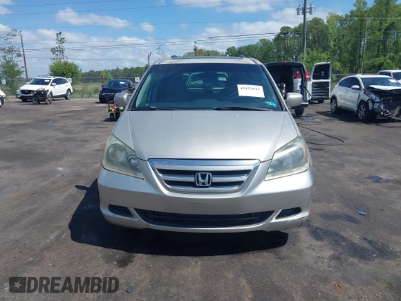 2006 Honda Odyssey EX-L with VIN 5FNRL387X6B429688, listed as a IAAI auction lot 42152841 with 178,806 mi miles and . Bid and sale history available at DreamBid. Image 12.