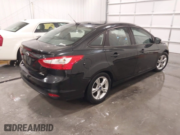 2014 Ford Focus SE with VIN 1FADP3F29EL287969, listed as a IAAI auction lot 41321168 with 98,898 mi miles. Bid and sale history available at carsss.com. Image 4.