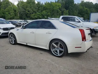 2011 Cadillac CTS Premium with VIN 1G6DS5ED2B0166031, listed as a Copart auction lot 63663675 with 158,709 mi miles and Salvage title. Bid and sale history available at DreamBid. Image 2.