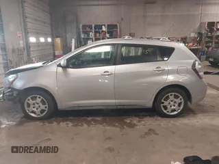 2009 Pontiac Vibe with VIN 5Y2SM67009Z422428, listed as a IAAI auction lot 41356815 with 63,924 mi miles. Bid and sale history available at carsss.com. Image 14.