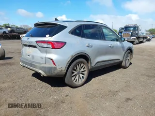 2020 Ford Escape SE Sport Hybrid with VIN 1FMCU0BZ3LUB70892, listed as a IAAI auction lot 41647671 with 38,691 mi miles and . Bid and sale history available at carsss.com. Image 4.