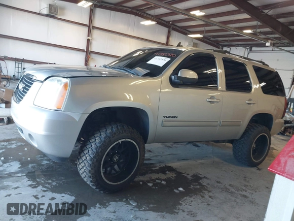2012 GMC Yukon SLT with VIN 1GKS2CE03CR134986, listed as a IAAI auction lot 41352570 with 141,098 mi miles. Bid and sale history available at carsss.com. Image 14.