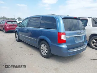 2011 Chrysler Town & Country Touring L z VIN 2A4RR8DG2BR799141, wystawiony jako IAAI lot #42058383 z przebiegiem 165 548 mil mil oraz . Historia ofert i sprzedaży dostępna na DreamBid. Obrazek 3.