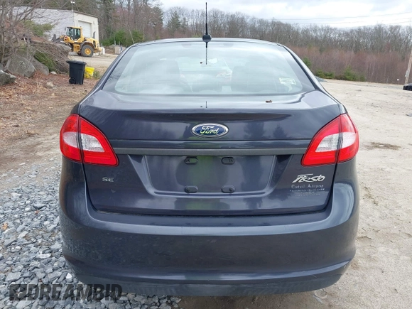 2012 Ford Fiesta SE with VIN 3FADP4BJ3CM152310, listed as a IAAI auction lot 42028398 with 124,530 mi miles and . Bid and sale history available at DreamBid. Image 16.