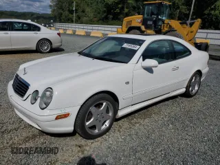 1999 Mercedes-Benz CLK 320/430 with VIN WDBLJ70G8XF077284, listed as a Copart auction lot 72495364 with 114,533 mi miles and Salvage Title. Bid and sale history available at carsss.com. Image 1.