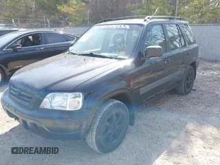1998 Honda CR-V LX z VIN JHLRD1740WC076533, wystawiony jako IAAI lot #42046673 z przebiegiem 201 946 mil mil oraz . Historia ofert i sprzedaży dostępna na DreamBid. Obrazek 2.