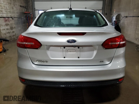 2017 Ford Focus SE with VIN 1FADP3F29HL223970, listed as a Copart auction lot 66022345 with 104,601 mi miles and Clean title. Bid and sale history available at DreamBid. Image 6.