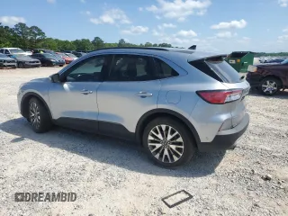 2021 Ford Escape Titanium Hybrid with VIN 1FMCU0DZXMUA78550, listed as a Copart auction lot 53389595 with 104,371 mi miles and Salvage title. Bid and sale history available at DreamBid. Image 2.