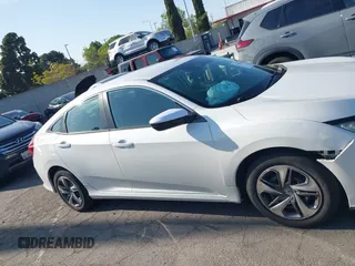 2019 Honda Civic Sedan LX with VIN 2HGFC2F62KH505921, listed as a IAAI auction lot 41982303 with 72,618 mi miles. Bid and sale history available at carsss.com. Image 13.