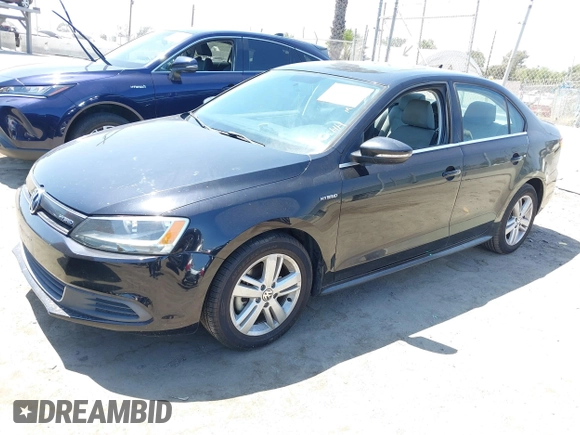 2013 Volkswagen Jetta Hybrid SE with VIN 3VW637AJ8DM299657, listed as a IAAI auction lot 42538101 with 128,822 mi miles and . Bid and sale history available at DreamBid. Image 2.