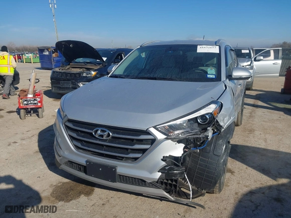 2017 Hyundai Tucson Value with VIN KM8J33A22HU457809, listed as a IAAI auction lot 41632652 with 26,154 mi miles. Bid and sale history available at carsss.com. Image 17.