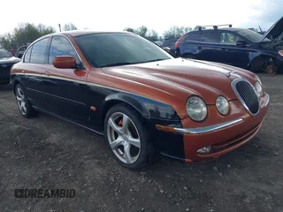 2001 Jaguar S-Type V6 z VIN SAJDA01C51FL84719, wystawiony jako IAAI lot #42192335 z przebiegiem 160 095 mil mil oraz . Historia ofert i sprzedaży dostępna na DreamBid. Obrazek 1.