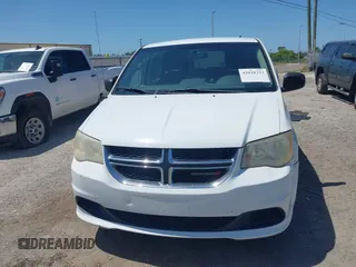 2014 Dodge Grand Caravan American Value with VIN 2C4RDGBG5ER187005, listed as a IAAI auction lot 42018333 with 216,149 mi miles and . Bid and sale history available at DreamBid. Image 12.