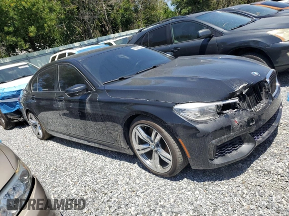 2016 BMW 7 Series 740i with VIN WBA7E2C52GG504096, listed as a Copart auction lot 49258935 with 111,267 mi miles and Salvage Title. Bid and sale history available at carsss.com. Image 4.
