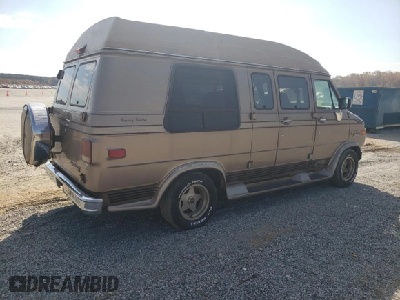 1995 Chevrolet Chevy Van z VIN 1GBEG25K9SF175004, wystawiony jako Copart lot #77952694 z przebiegiem 217 649 mil mil oraz Szkoda całkowita • Salvage title. Historia ofert i sprzedaży dostępna na DreamBid. Obrazek 3.