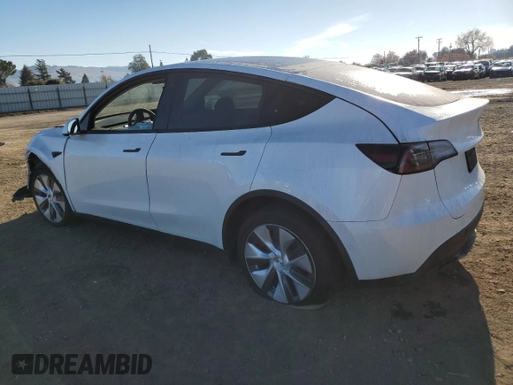 2020 Tesla Model Y Long Range with VIN 5YJYGDEE4LF015455, listed as a Copart auction lot 84223984 with 77,398 mi miles and Salvage Title. Bid and sale history available at DreamBid. Image 2.