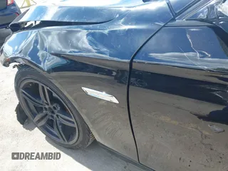 2014 BMW 5 Series 535i with VIN WBA5B1C58ED481934, listed as a IAAI auction lot 41793504 with 190,773 mi miles and . Bid and sale history available at DreamBid. Image 21.