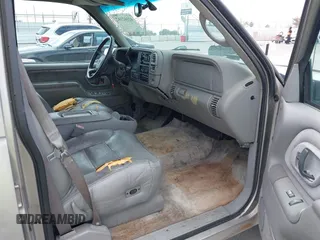1999 Chevrolet Tahoe Z71 with VIN 1GNEK13R4XJ504675, listed as a IAAI auction lot 42162102 with 320,128 mi miles and . Bid and sale history available at DreamBid. Image 5.