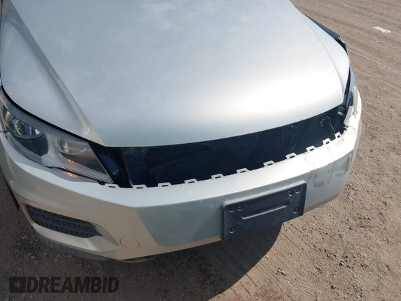 2013 Volkswagen Tiguan SE z VIN WVGBV7AX3DW502501, wystawiony jako IAAI lot #42827693 z przebiegiem 107 413 mil mil oraz . Historia ofert i sprzedaży dostępna na DreamBid. Obrazek 6.