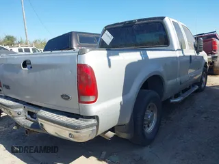 2003 Ford Super Duty F-250 XL with VIN 1FTNX20F83EA74842, listed as a IAAI auction lot 41620325 with 407,621 mi miles. Bid and sale history available at carsss.com. Image 4.